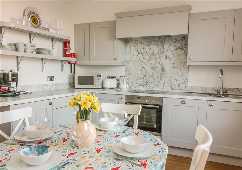 The kitchen and dining area at 3 Melbury, Salcombe, Devon