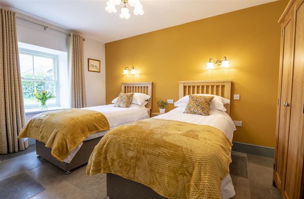 Bedroom three with twin 3’ single beds at 3 Mill Cottages, Richmond