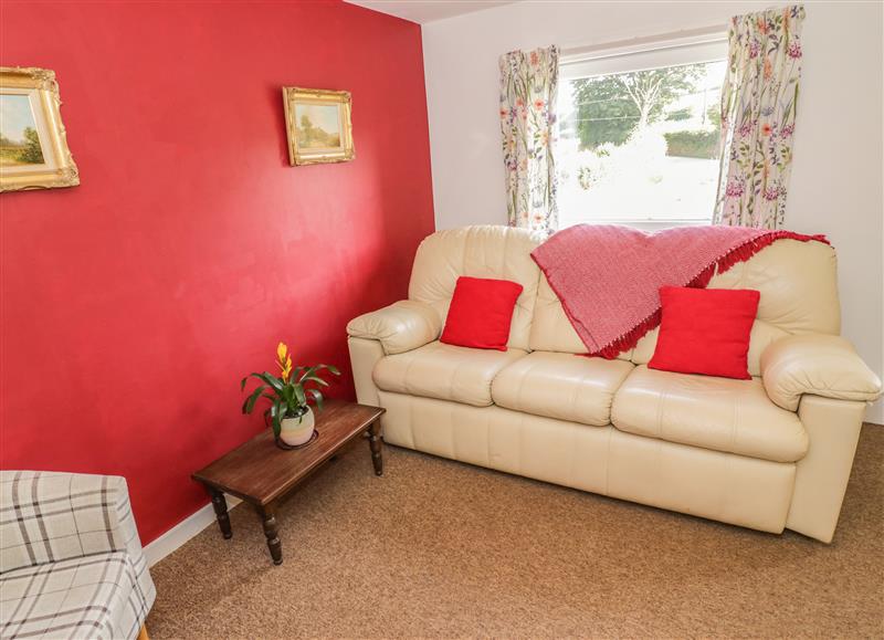 Relax in the living area at 3 Oaks Lodge, Pulverbatch near Pontesbury