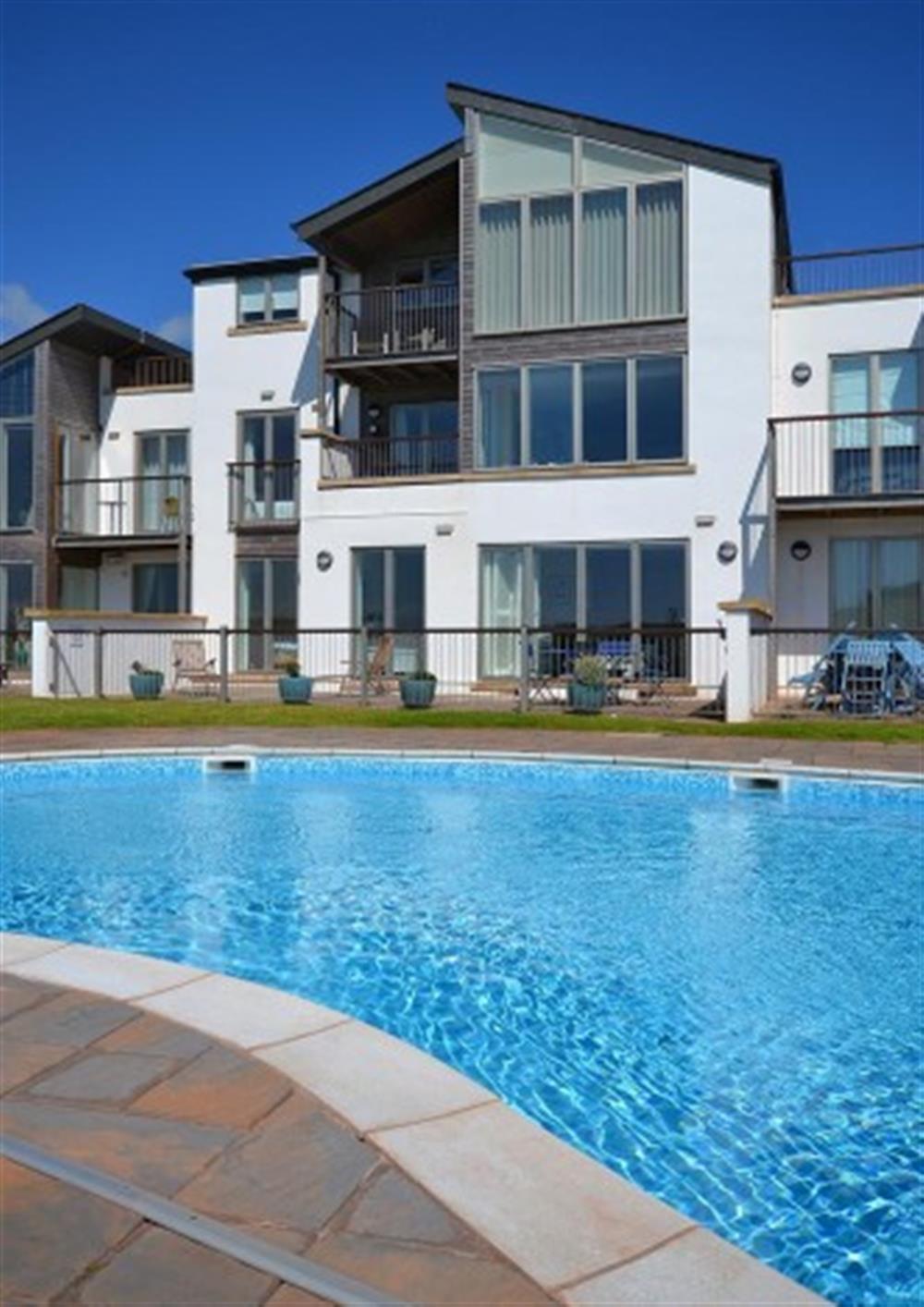 The apartment and pool. at 3 Oceans Edge in Thurlestone