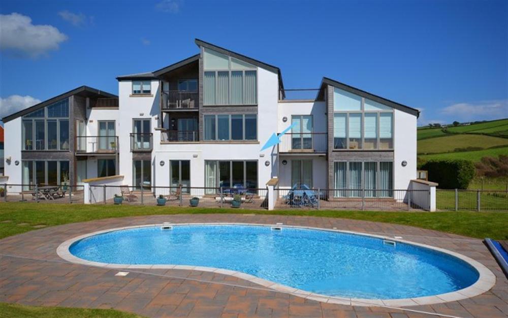 The pool with the apartment arrowed. at 3 Oceans Edge in Thurlestone