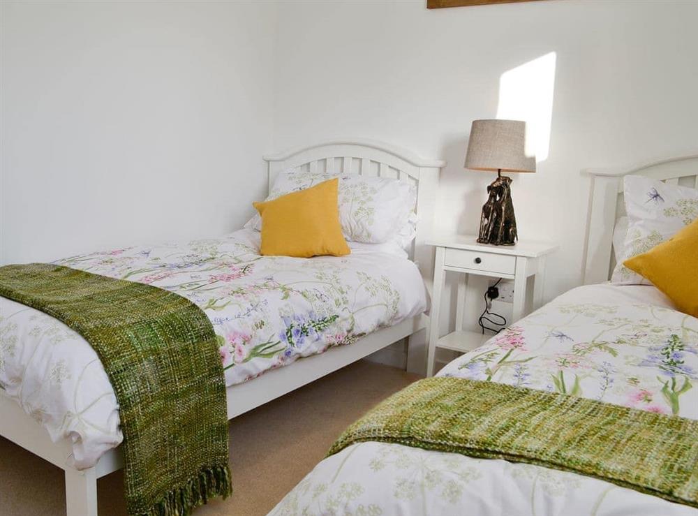 Lovely bedroom with twin single beds at 3 Old Posting Stables in Gatehouse of Fleet, near Kirkcudbright, Kirkcudbrightshire