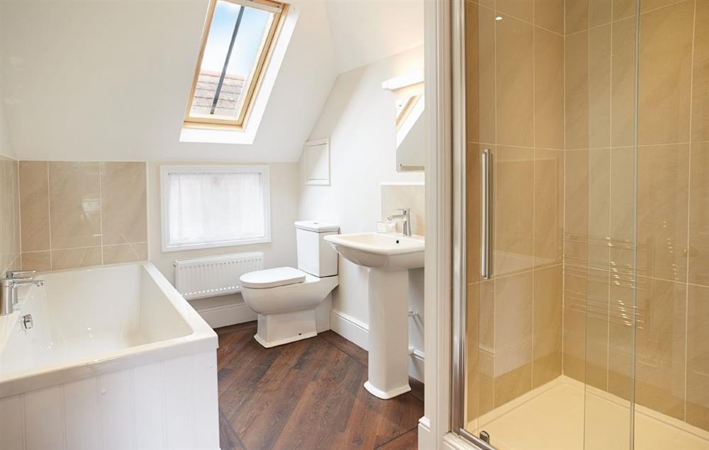 First floor:  En-suite bathroom to bedroom one with bath and separate shower at 3 Palace Yard, Hereford