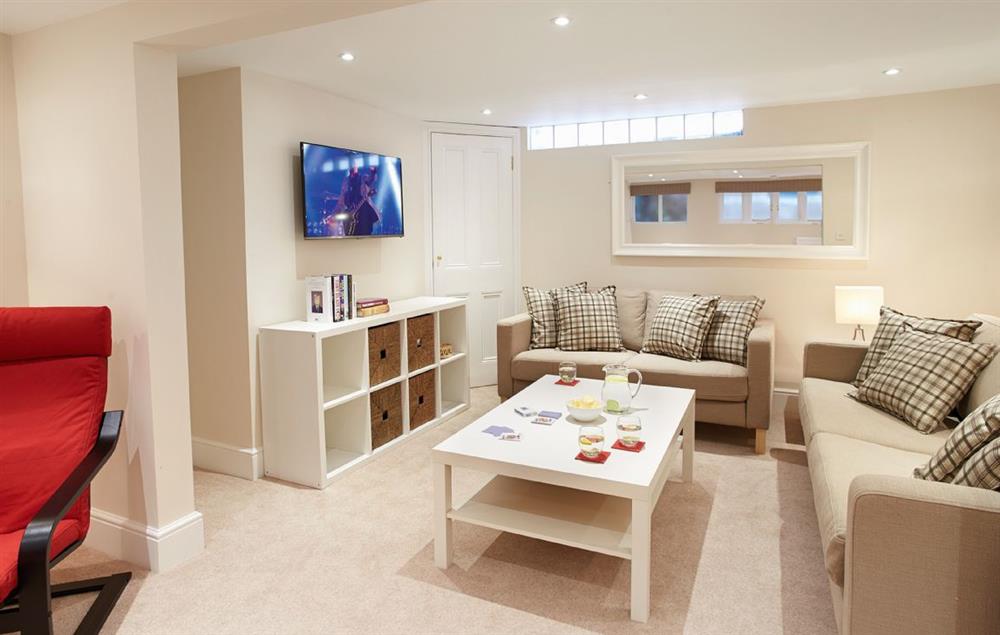 Lower Ground Floor:  A great den for younger guests, the games room has a television, football table, books and games
