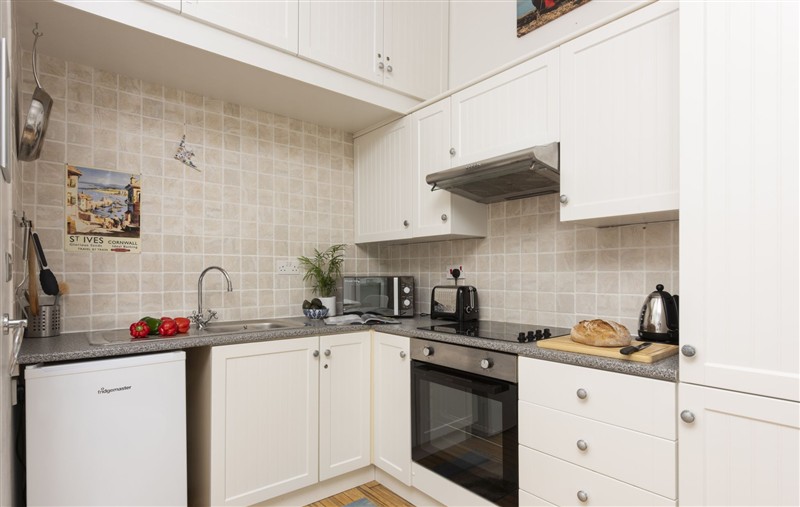This is the kitchen (photo 2) at 3 Pentowan Court, Cornwall