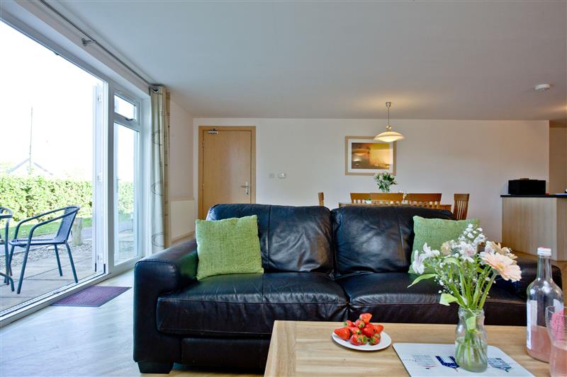 Living room at 3 Red Rock Apartments, Dawlish Warren, Devon