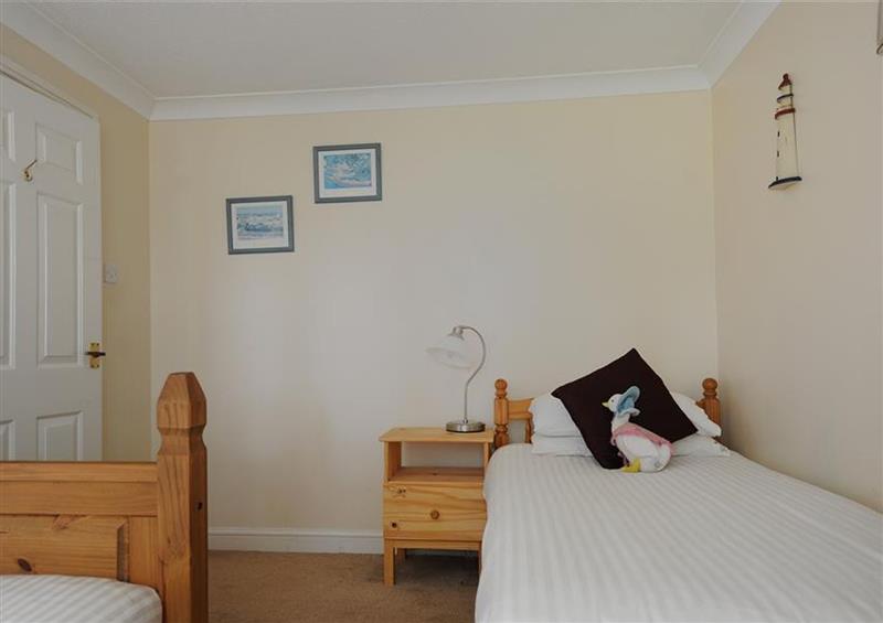 One of the bedrooms at 3 Riverside Cottages, Charmouth