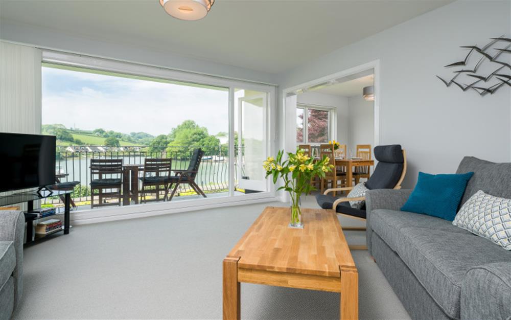 The lounge area leads out to the balcony, the perfect spot to admire the view!  at 3 Riverside in Kingsbridge