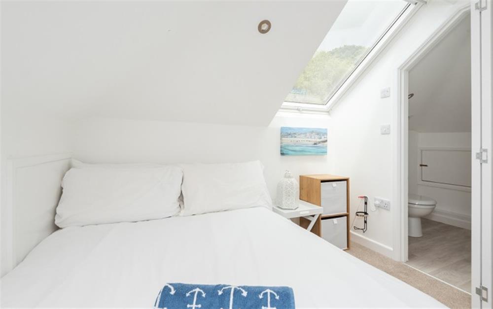 There's a second double bedroom upstairs via the spiral staircase. at 3 The Boat House in Helford Passage