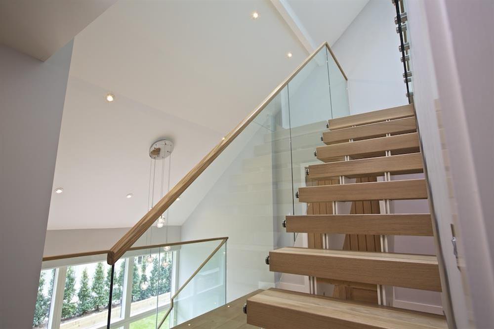 Access to the second floor via an oak and glass staircase (photo 3) at 3 The Drive in , Hillfield, Dartmouth