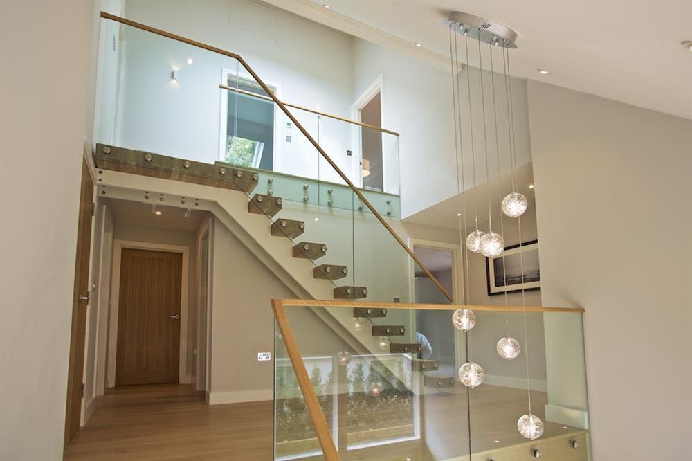 Access to the second floor via an oak and glass staircase at 3 The Drive in , Hillfield, Dartmouth