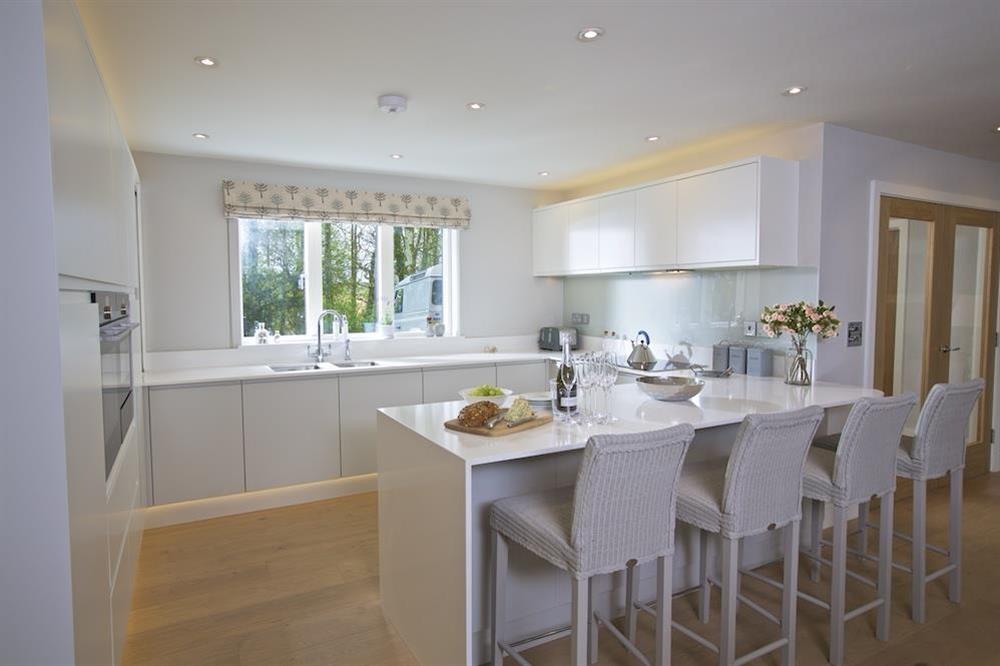 Elegantly designed kitchen with breakfast bar at 3 The Drive in , Hillfield, Dartmouth