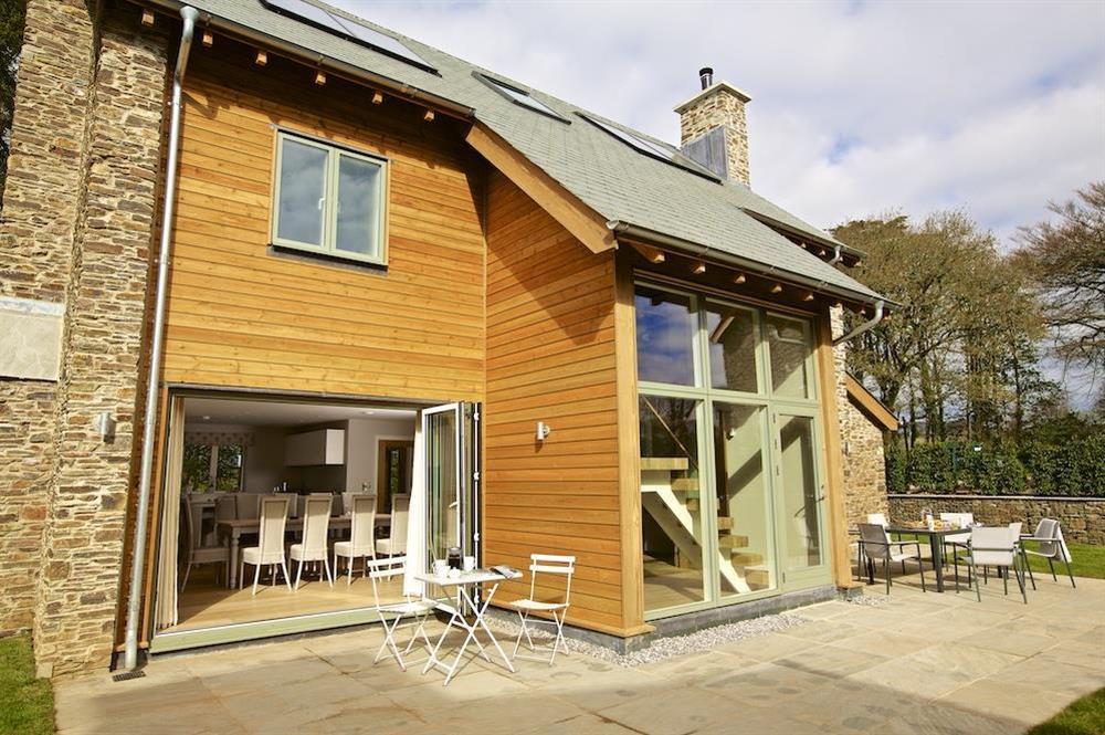 Good-sized stone terrace - furnished with a garden table and eight chairs at 3 The Drive in , Hillfield, Dartmouth