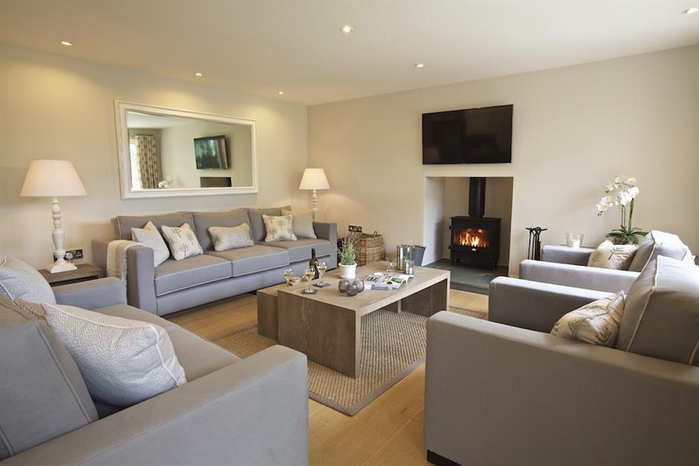 The sitting area to one end features a delightful wood-burning stove at 3 The Drive in , Hillfield, Dartmouth