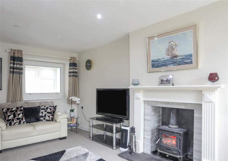 Relax in the living area at 3 Tyn Giat, Penysarn near Amlwch