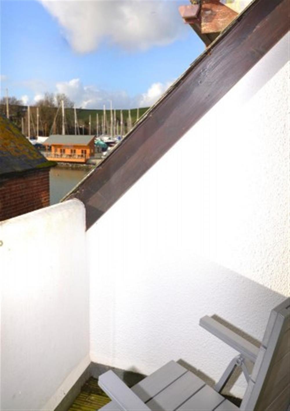 The balcony off the twin room with views of an estuary inlet at 3 Waters Edge in Salcombe