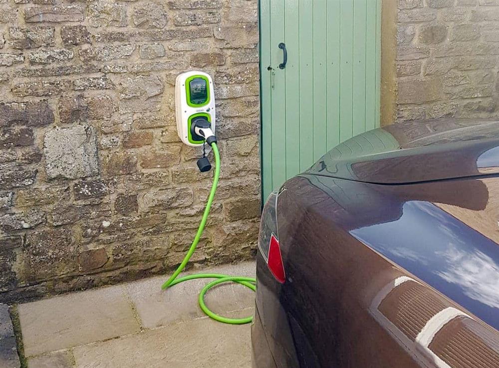 Electric car charging port at 3 Winville Mews in Askrigg, near Hawes, North Yorkshire