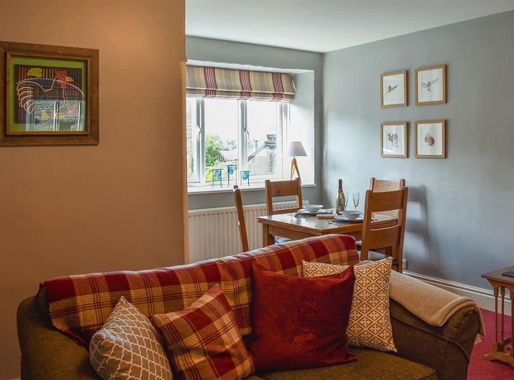 Living and adjacent dining area at 3 Winville Mews in Askrigg, near Hawes, North Yorkshire