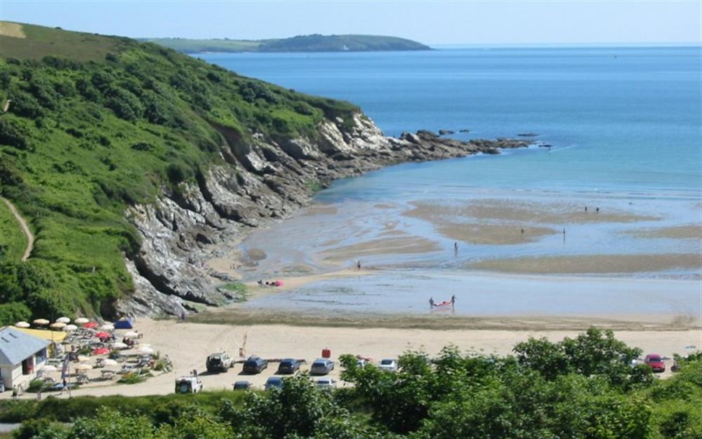 A view of the beach and bay from the grounds of the estate at 30 Lower Stables in Maenporth