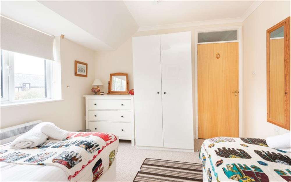 There's plenty wardrobe and drawer space in the twin bedroom at 30 Lower Stables in Maenporth