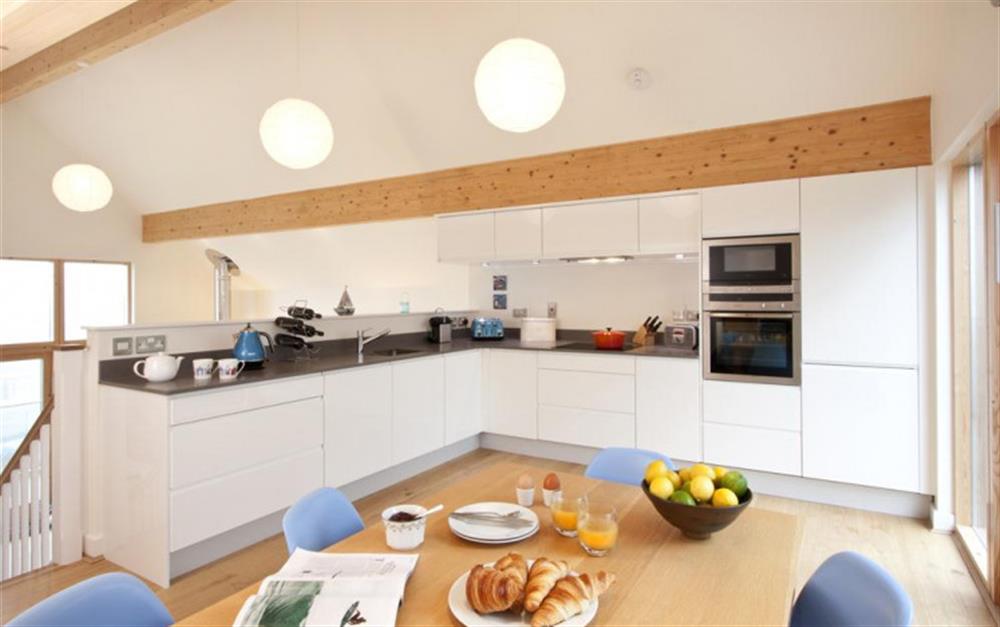 The kitchen and dining area at 30 Talland in Talland Bay