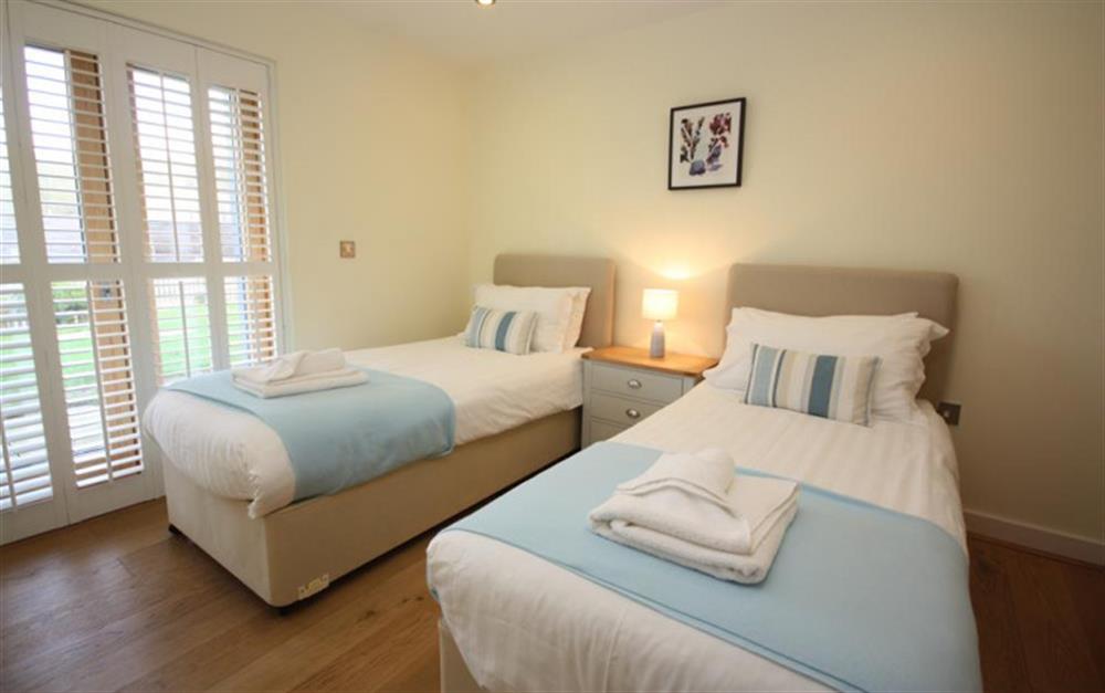 The twin bedroom at 30 Talland in Talland Bay