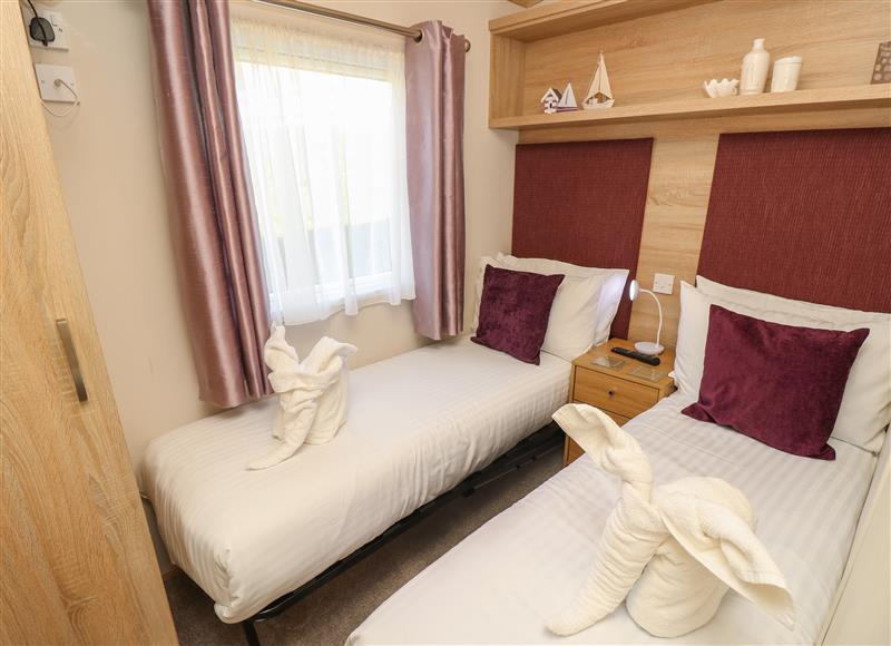 A bedroom in 31 Crosswinds at 31 Crosswinds, Whitecliff Bay Holiday Park near Bembridge