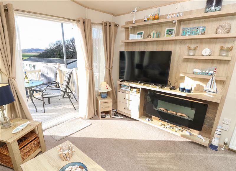 Relax in the living area at 31 Crosswinds, Whitecliff Bay Holiday Park near Bembridge
