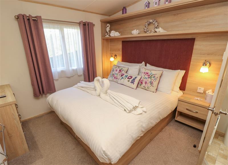 This is a bedroom at 31 Crosswinds, Whitecliff Bay Holiday Park near Bembridge