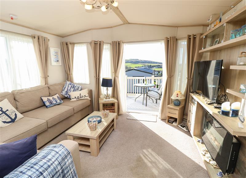 This is the living room at 31 Crosswinds, Whitecliff Bay Holiday Park near Bembridge