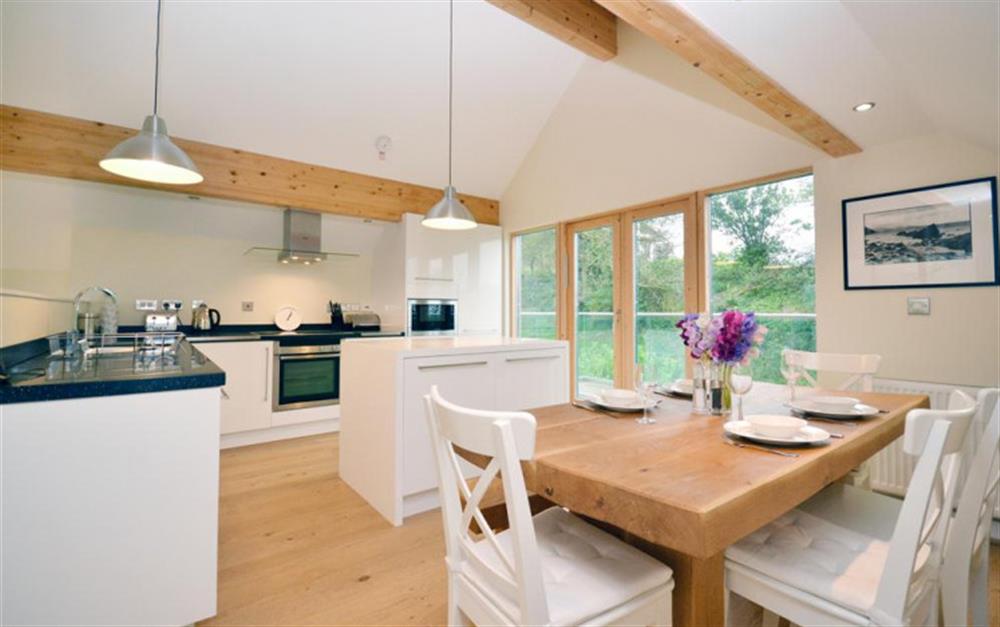 The kitchen and dining area at 31 Talland in Talland Bay