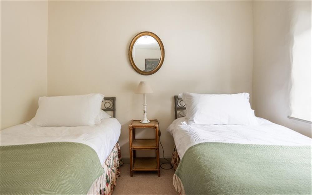 A closer look at the elegant twin bedroom  at 32 Noss Mayo in Noss Mayo