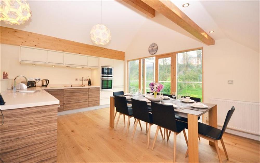 The kitchen and dining area at 32 Talland in Talland Bay