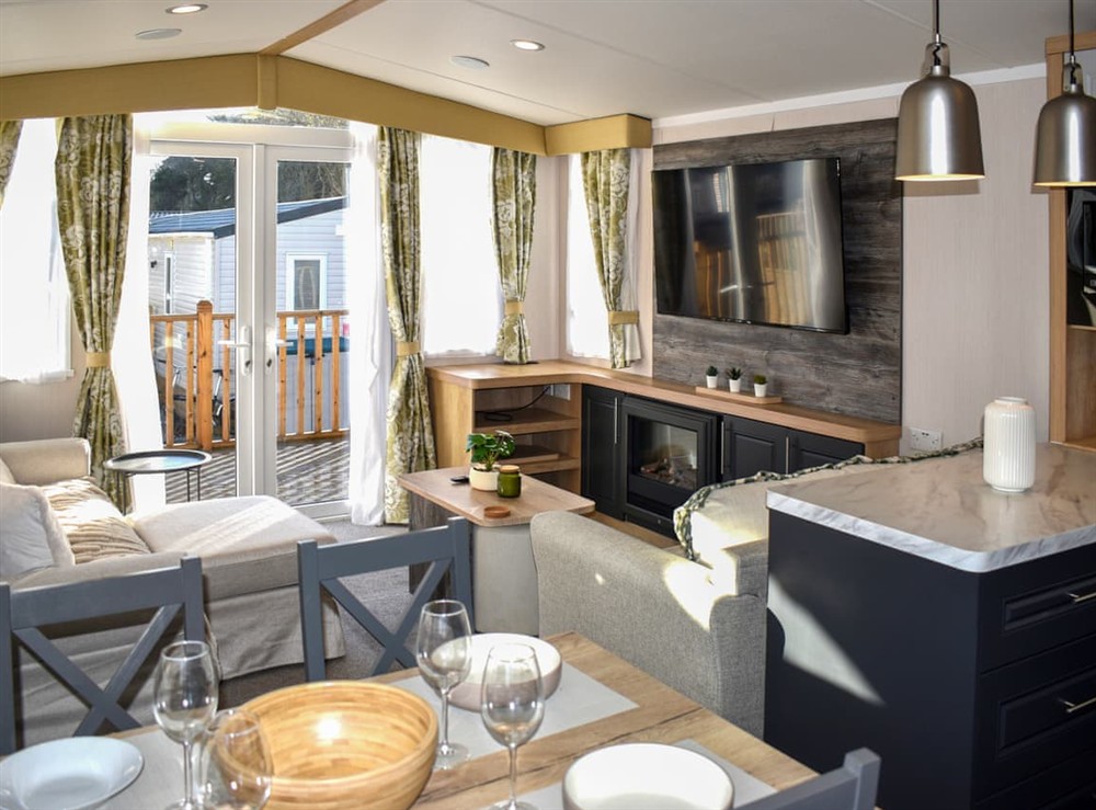 Open plan living space at 32 Woodleigh Park in Cheriton Bishop, Devon