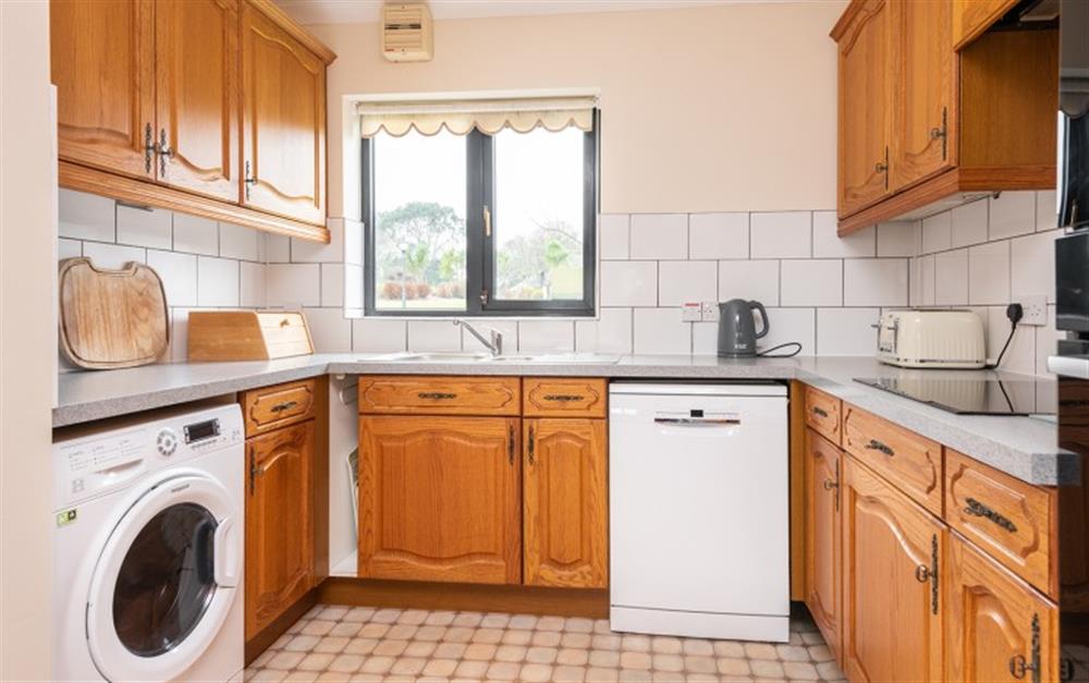 The kitchen is well equipped with lots of cupboard space at 33 Lower Stables in Maenporth