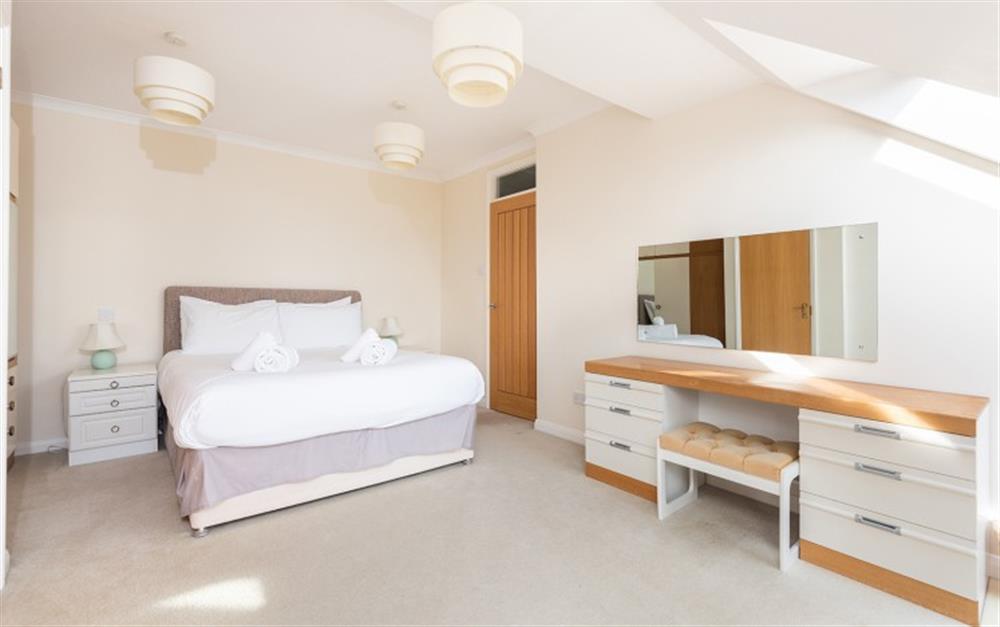 The master bedroom is very spacious at 33 Lower Stables in Maenporth