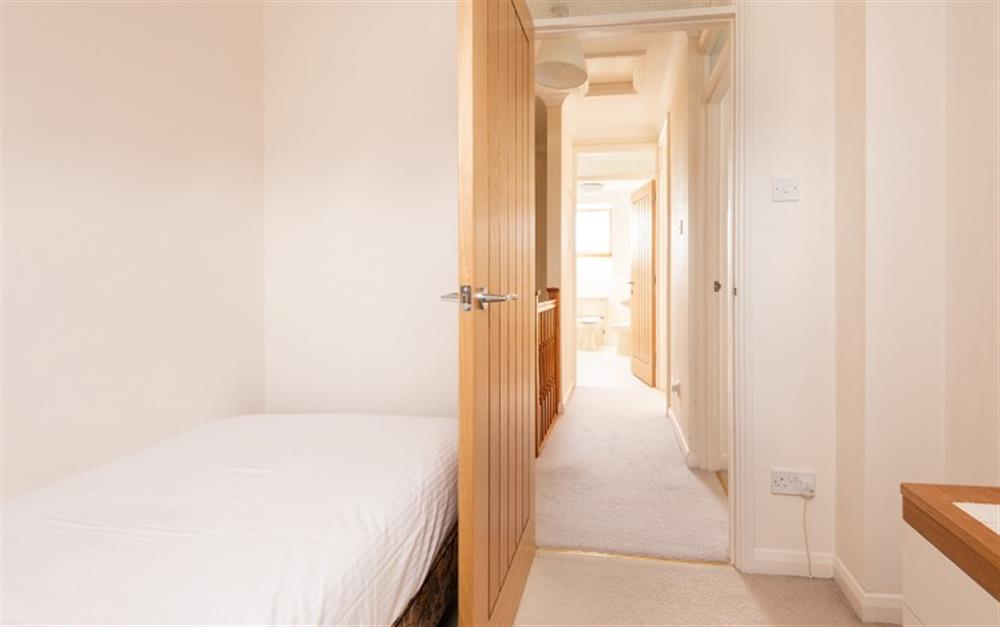 The view of the landing from the single bedroom, the other two bedrooms are on the right. at 33 Lower Stables in Maenporth