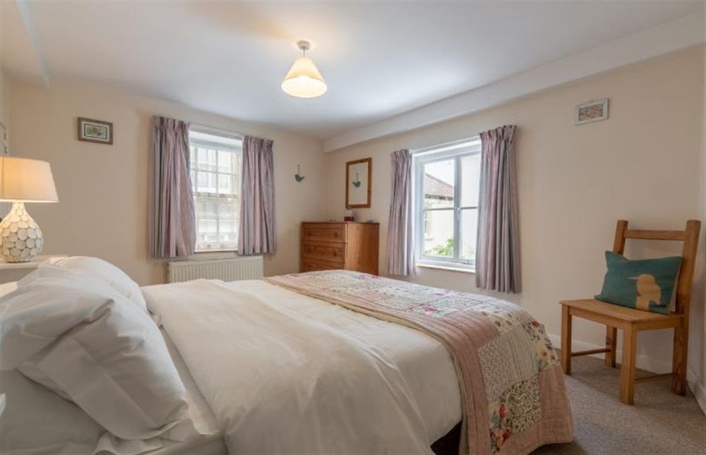 Duel aspect Bedroom two has king-size bed at 36 High Street, Wells-next-the-Sea