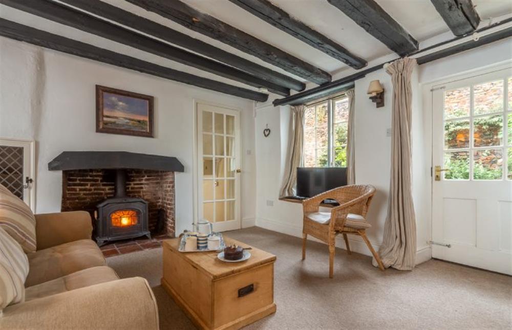 Sitting room has wood burning stove at 36 High Street, Wells-next-the-Sea