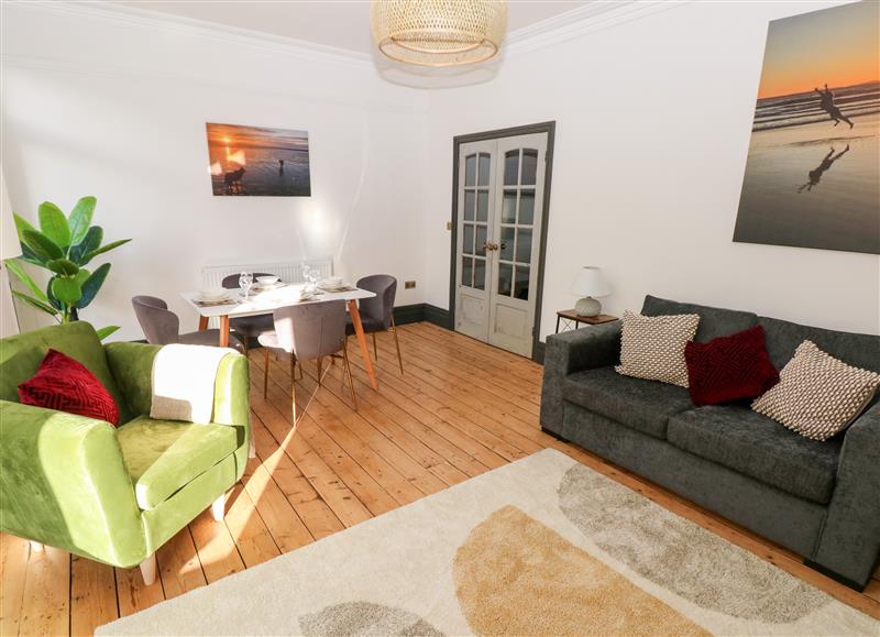 Relax in the living area at 36A Mary Street, Porthcawl