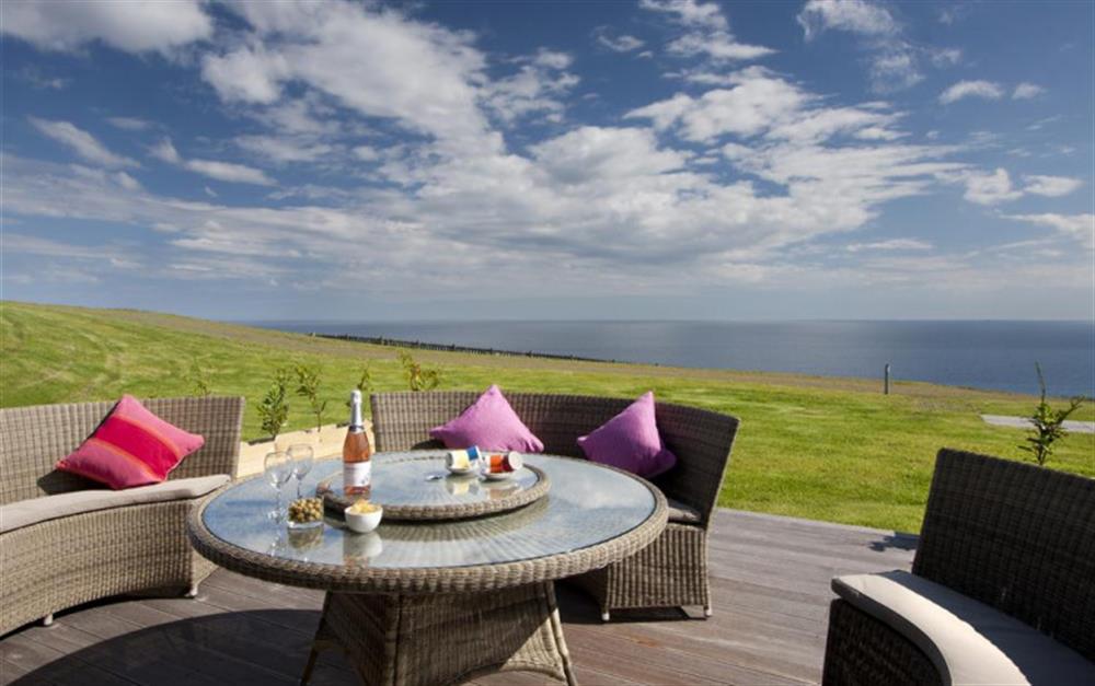 The outside decking area with far reaching sea views at 37 Talland in Talland Bay