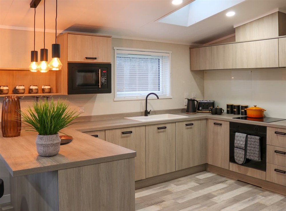 Kitchen (photo 2) at 38 at the Sanctuary Lodges in Rhosfawr, near Pwllheli, Gwynedd