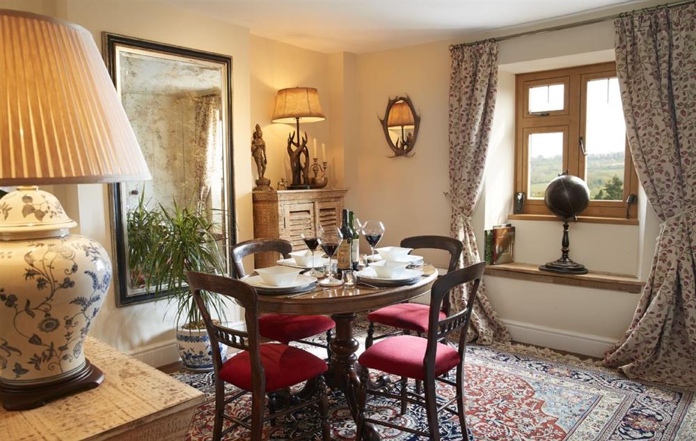 Ground floor: Dining room with rear views of the Cotswold countryside at 39 Foxtail Cottage, Blockley
