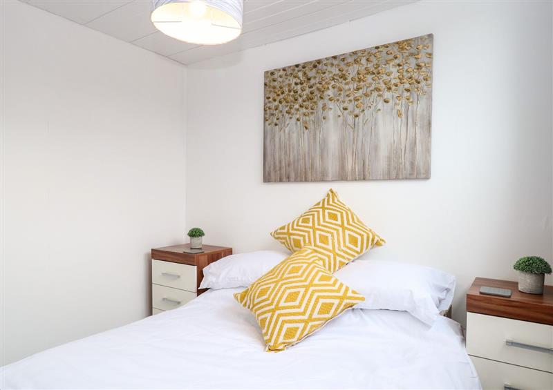 One of the 2 bedrooms at 39 Hawaii Beach Bungalows, Nafferton