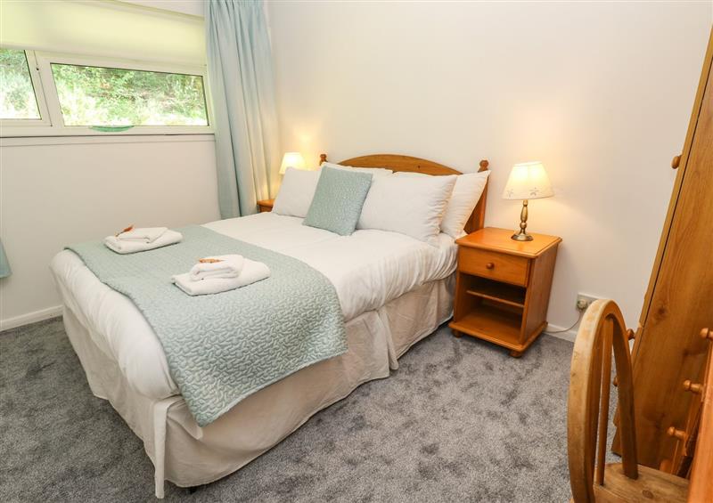 One of the bedrooms at 39 Manorcombe Bungalows, Honicombe Holiday Village near Drakewalls