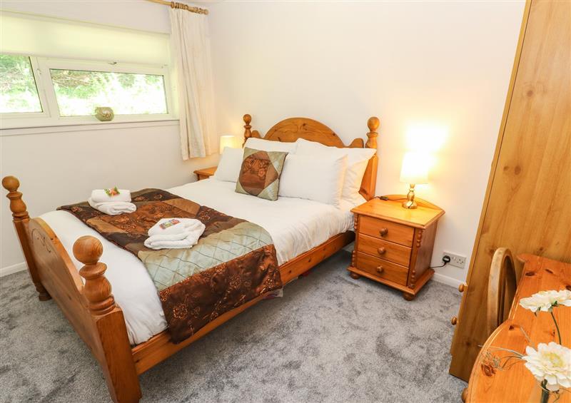 This is a bedroom at 39 Manorcombe Bungalows, Honicombe Holiday Village near Drakewalls