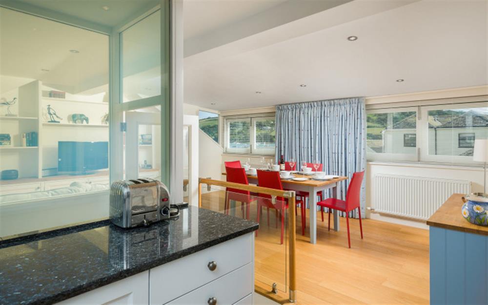 The dining area as seen from the kitchen at 3A Island Terrace in Salcombe