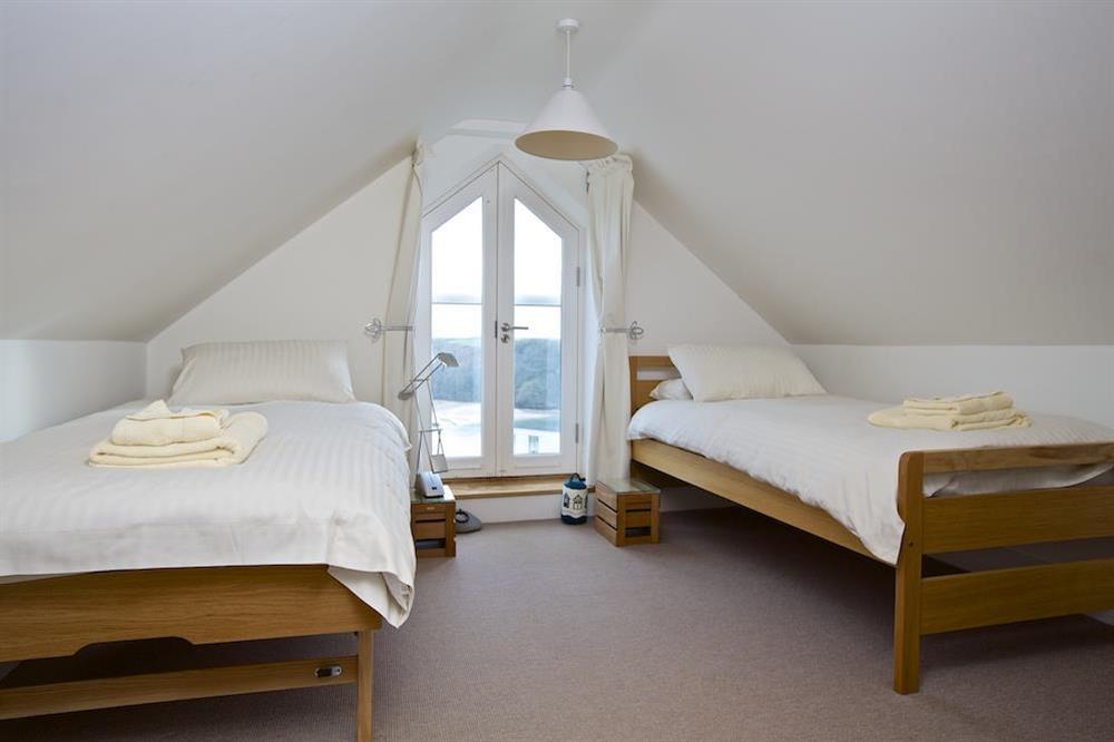 Twin bedroom with small French doors and lovely views at 4 Blue View in , Salcombe