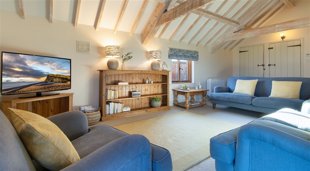 4 Cart Lodge Barn kitchen dining sitting room open plan at 4 Cart Lodge Barn in Upper Sheringham, Norfolk