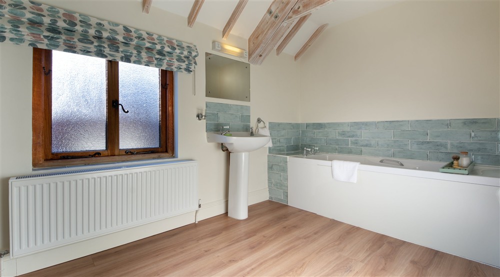 The bathroom at 4 Cart Lodge Barn in Upper Sheringham, Norfolk